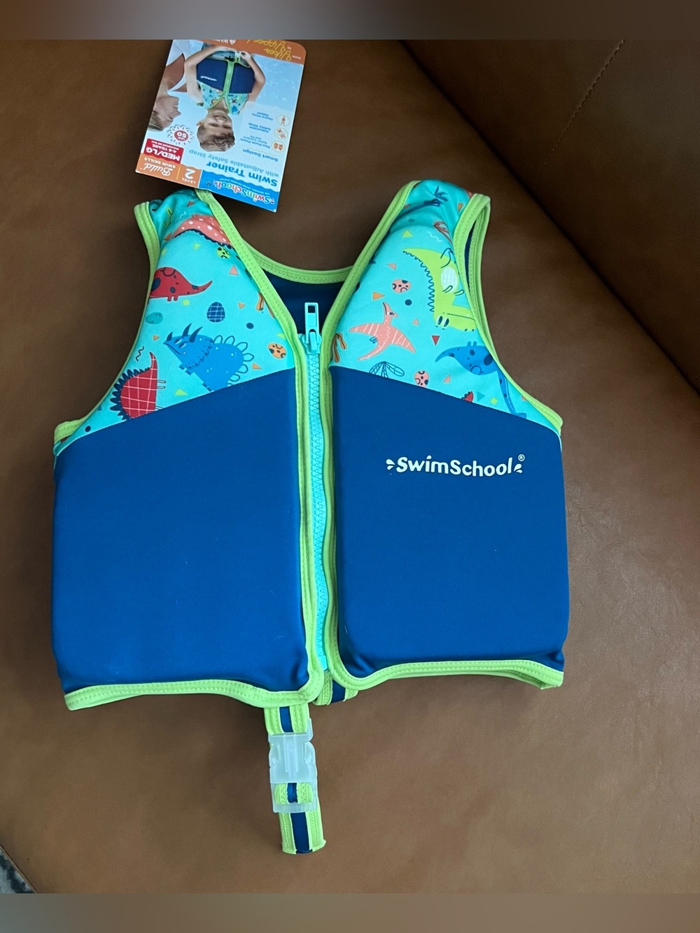 SwimSchool Level 2 Swim Trainer Vest MD/LG 4-6 years, colorful dinosaur print.